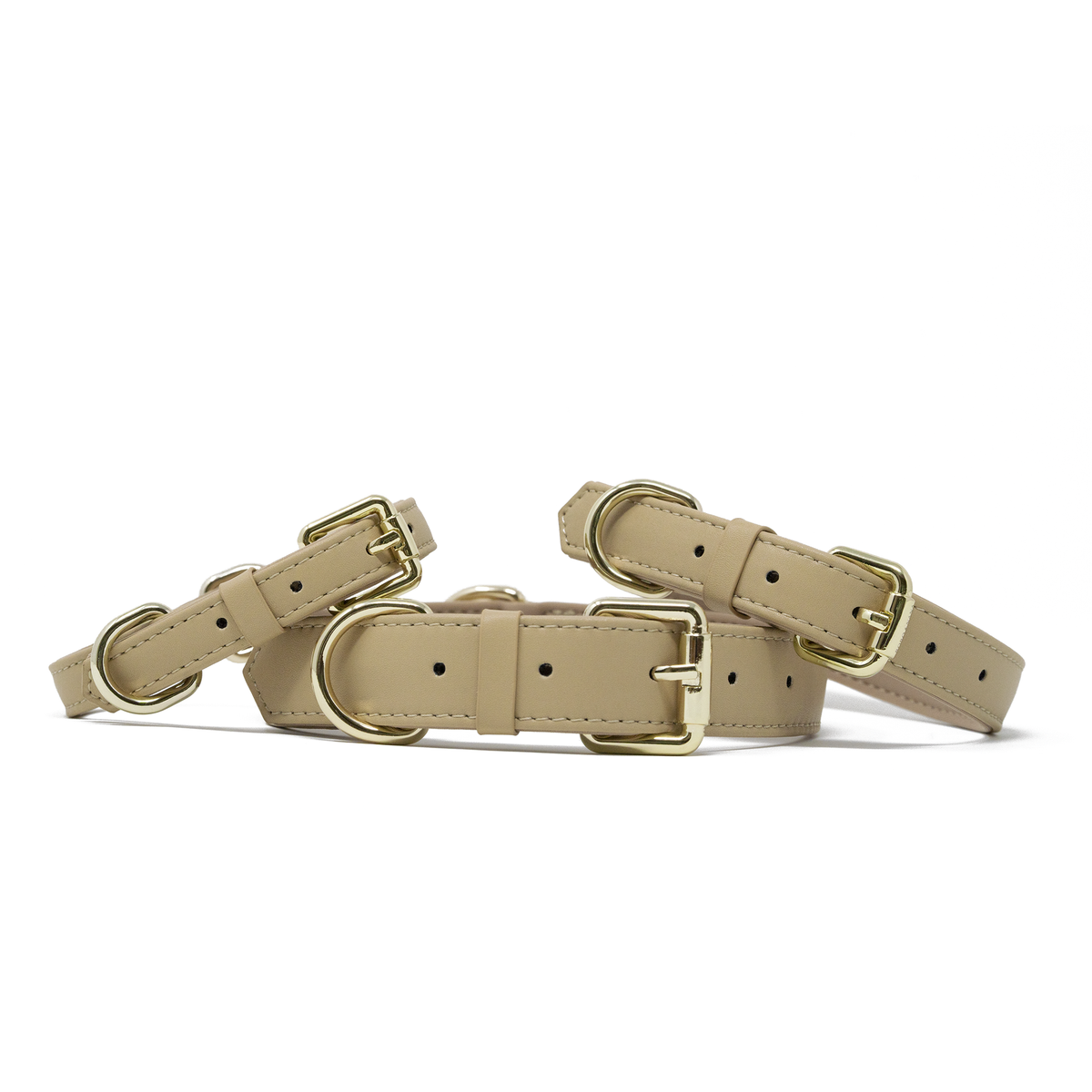 Cream Beige dog collars in multiple sizes with premium gold hardware and soft padded lining.