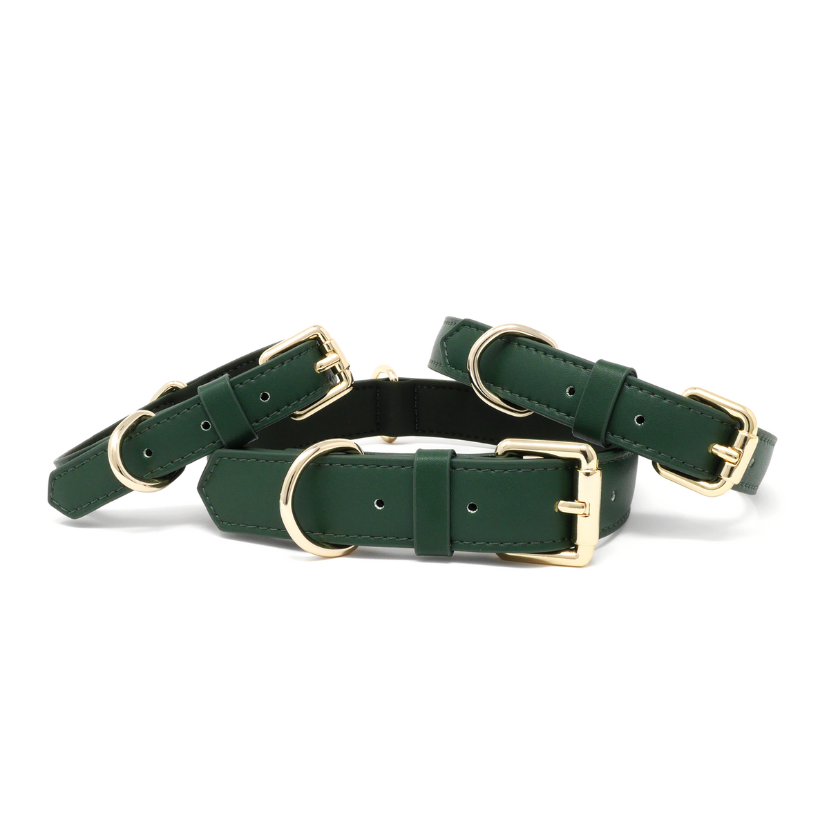 Forest Green dog collars in multiple sizes with premium gold hardware and soft padded lining.