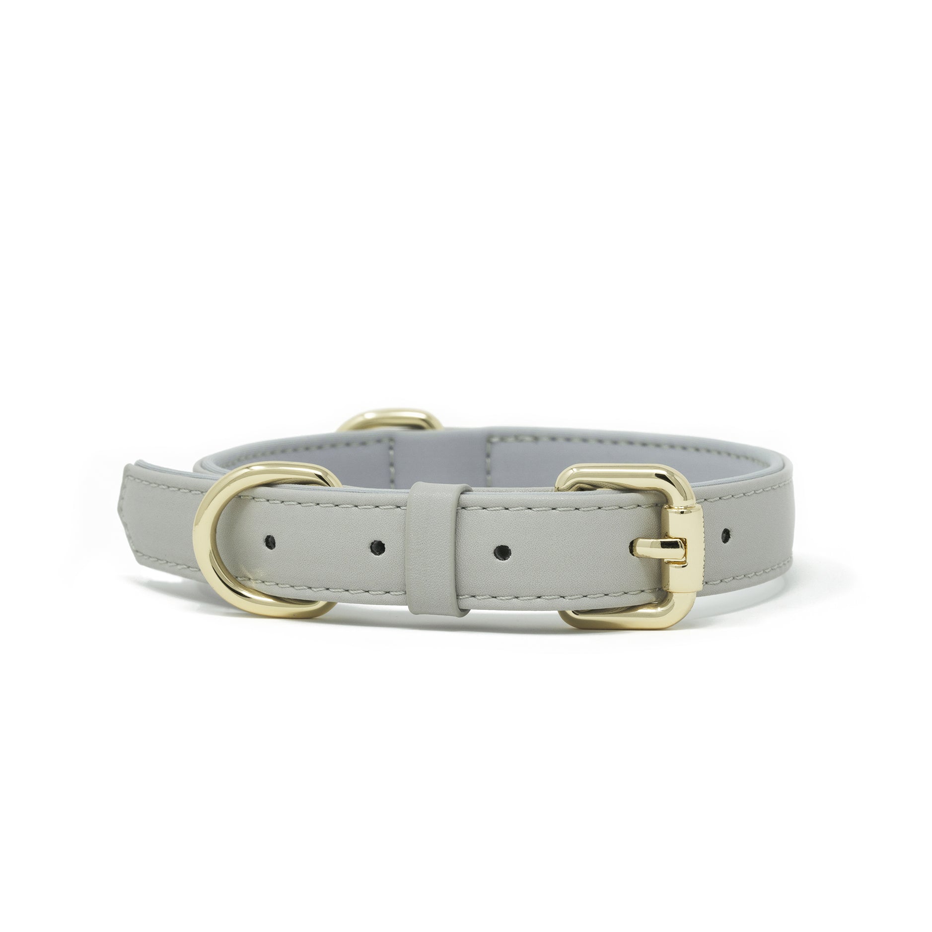 A Pearl Gray vegan leather dog collar with silver-tone metal hardware, including a D-ring and buckle, shown against a plain white background.
