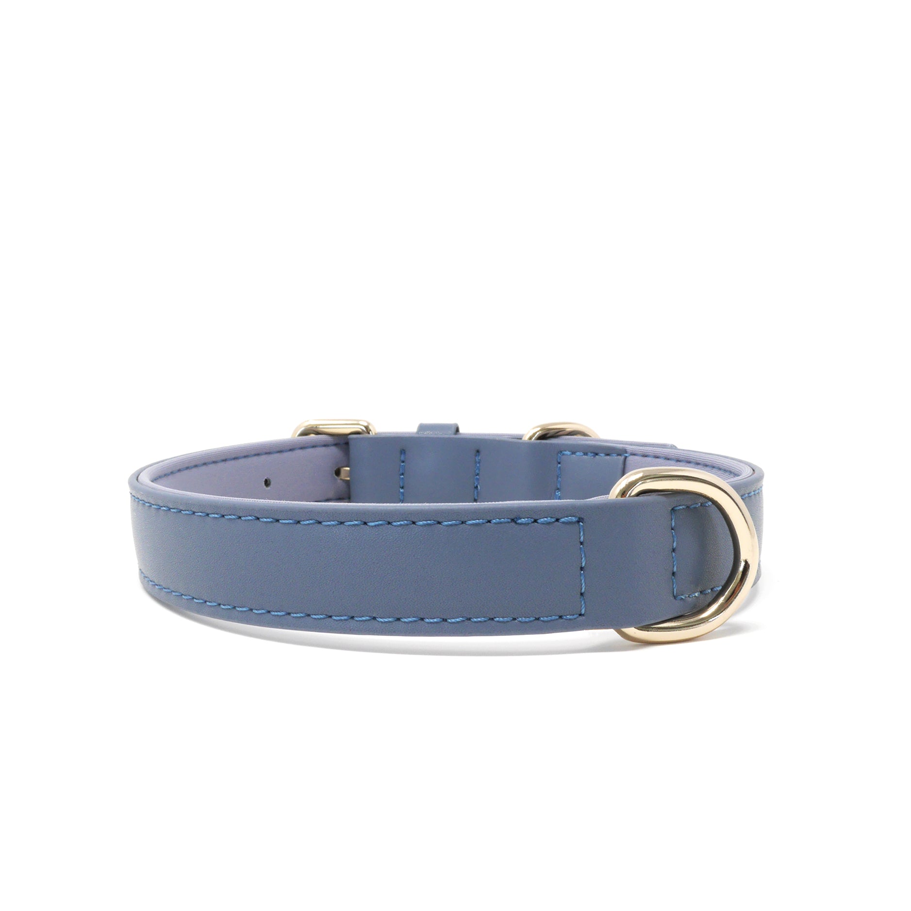 Stone Blue vegan leather dog collar with gold-tone metal hardware, including a buckle and D-ring, shown against a plain white background.