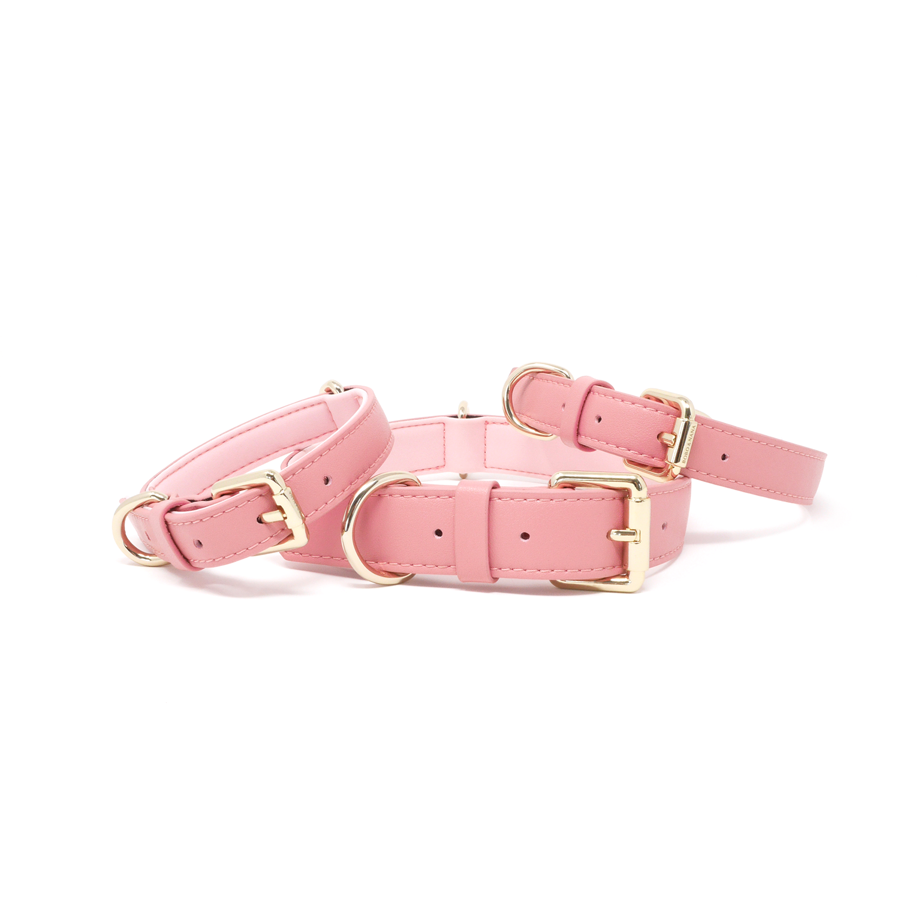 Baby Pink dog collars in multiple sizes with premium gold hardware and soft padded lining.