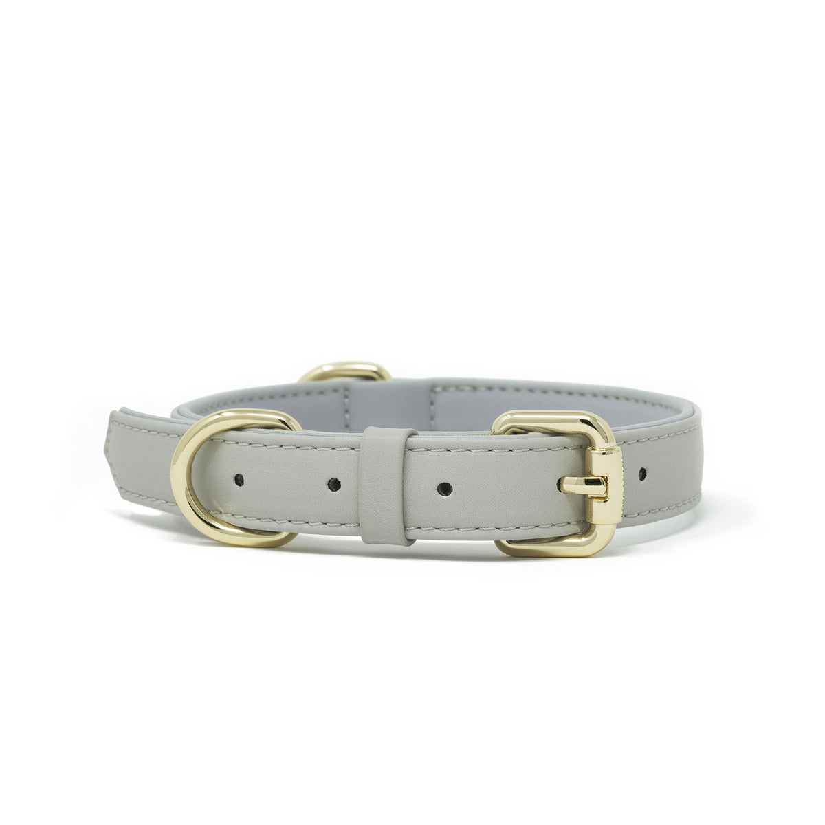 A Pearl Gray vegan leather dog collar with silver-tone metal hardware, including a D-ring and buckle, shown against a plain white background.